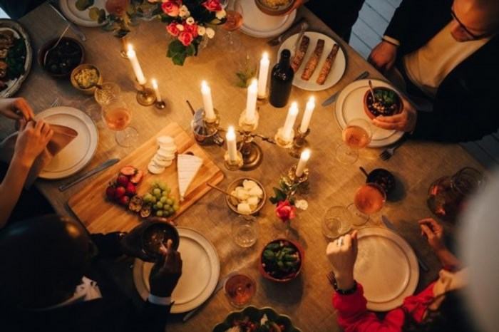 Enjoying a warm and cozy dinner with the family is a precious and heartwarming experience that strengthens bonds and creates cherished memories.
