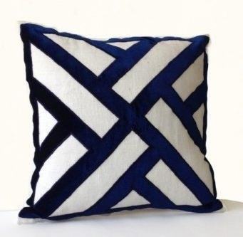 The Ivory Linen and Navy Blue Velvet Applique Pillow Cover is a luxurious home decor item that combines the elegance of ivory linen with the richness of navy blue velvet, creating a stunning contrast and adding a touch of sophistication to any living space.