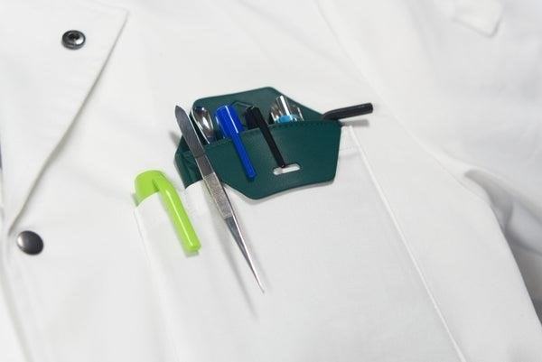 A lab coat pocket protector is a small accessory that is used to keep pens, pencils, and other small items secure and easily accessible while working in a laboratory setting. It is made of durable material and is designed to fit perfectly into the pocket of a lab coat, providing convenience and organization for scientists, researchers, and other professionals in the field.