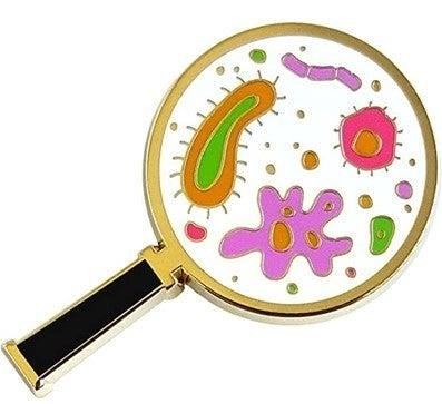 The Microbes In Magnifying Glass Enamel Lapel Pin is a creative and unique accessory that showcases the beauty and intricacy of microscopic organisms, while adding a touch of style to any outfit.