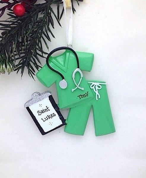 The Personalized Scrubs Ornament is a perfect keepsake for healthcare professionals, showcasing their dedication and commitment to caring for others.