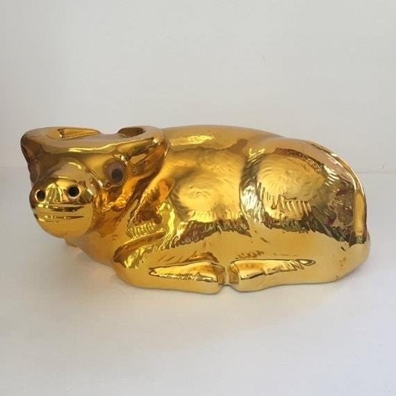 The Vintage Gold Ox Statue is a magnificent piece of artwork that showcases the beauty and craftsmanship of ancient civilizations, serving as a symbol of prosperity, strength, and cultural heritage.