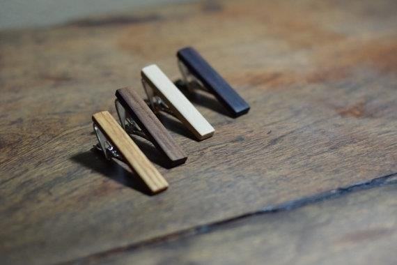 A wood tie clip is a stylish and environmentally-friendly accessory that adds a touch of nature to your formal attire.