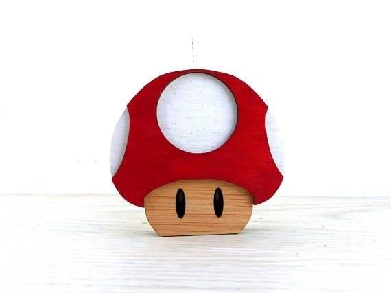 Standing Mario Mushroom is a popular video game icon that is recognized worldwide, known for its distinctive red and white spotted design, and is often associated with the Super Mario franchise.