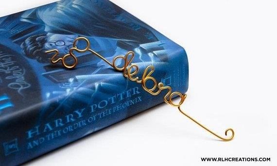 A personalized wire bookmark is a thoughtful and unique accessory that can be customized to suit individual preferences, making it a perfect gift for book lovers and avid readers.