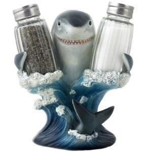 The Shark Salt & Pepper Shaker Set is a fun and quirky addition to any dining table, adding a touch of marine charm to your meals.