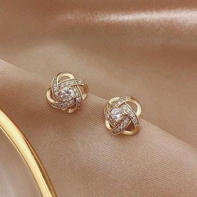 These sparkly earrings are the perfect accessory to add some glamour and sparkle to any outfit.