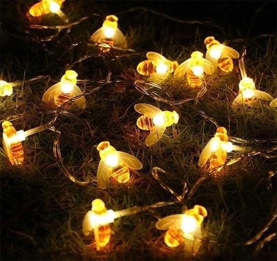 Honeybee Fairy String Lights are a whimsical and enchanting addition to any outdoor or indoor space, adding a touch of magic and warmth with their delicate glow and adorable honeybee designs.