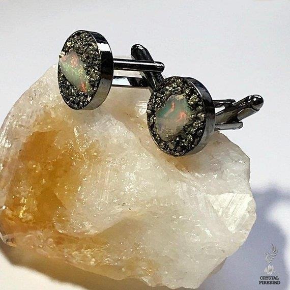 Raw Opal Cufflinks are elegant and sophisticated accessories that add a touch of luxury and style to any formal attire, perfect for special occasions or adding a touch of glamour to everyday outfits.
