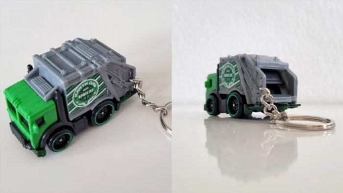 The Mini Garbage Truck Keychain is a small, portable keychain that is designed to resemble a miniature version of a garbage truck. It is a fun and unique accessory that can be attached to your keys or bag, allowing you to show off your love for garbage trucks.