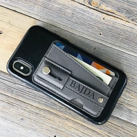 The Personalized Phone Stand Wallet is a convenient and practical accessory that allows you to securely hold your phone while also providing storage for your essential cards and cash. It is designed with a personalized touch, making it a stylish and unique accessory for your everyday use.
