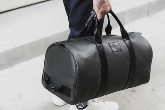 The cool gym bag is the perfect gift for your brother, providing him with a stylish and practical way to carry his workout essentials.