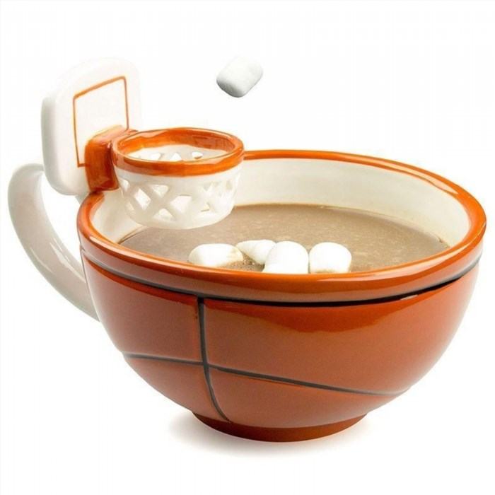 MAX'IS Creations The Mug With A Hoop is a fun and innovative product that allows you to play basketball while enjoying your favorite beverage. It features a built-in hoop and ball, making it perfect for sports enthusiasts or anyone looking to add a playful twist to their drinking experience.