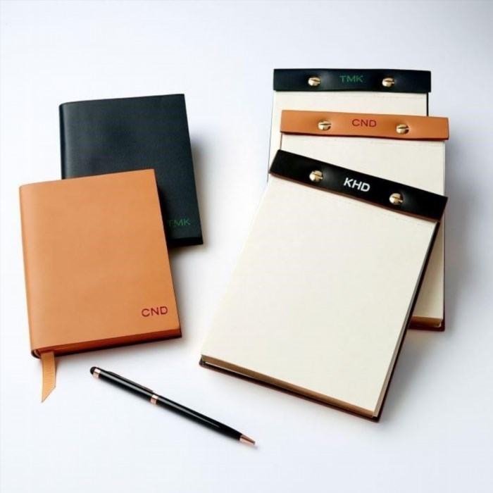 The Mark & Graham Italian Leather Desk Notepad is a luxurious and stylish stationery item that adds elegance and sophistication to any workspace. Crafted from high-quality leather, this desk notepad features a smooth writing surface and exquisite detailing, making it a perfect accessory for professionals and creatives alike. Whether used for jotting down notes, brainstorming ideas, or organizing tasks, this Italian leather desk notepad is sure to elevate your productivity and make a statement in your office or home.
