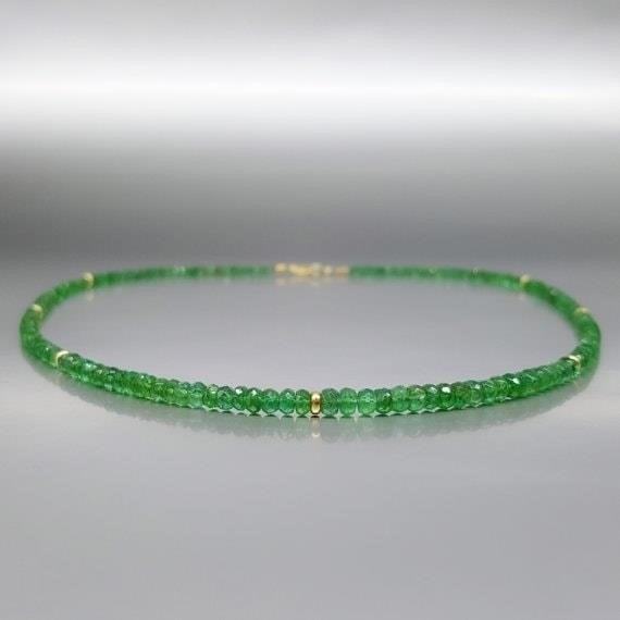 The Elegant Fine Emerald Necklace is a stunning piece of jewelry that exudes sophistication and beauty, perfect for adding a touch of glamour to any outfit.