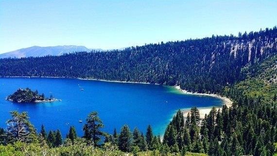 Emerald Bay Photograph captures the mesmerizing beauty of one of the most picturesque coastal spots, showcasing the stunning emerald green waters, pristine sandy beaches, and the surrounding lush greenery.