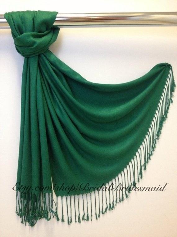 The Emerald Green Pashmina is a luxurious and vibrant accessory that adds elegance and style to any outfit, perfect for both casual and formal occasions.