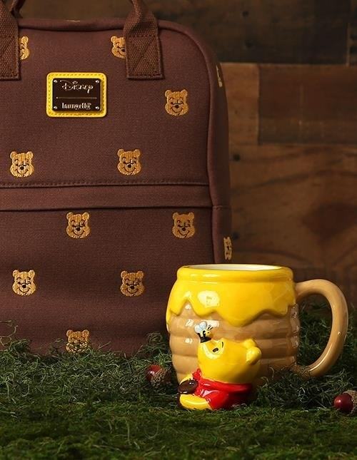 The Winnie the Pooh Mug is a delightful and whimsical mug featuring the beloved character from A.A. Milne's classic books, perfect for enjoying a warm cup of tea or coffee.