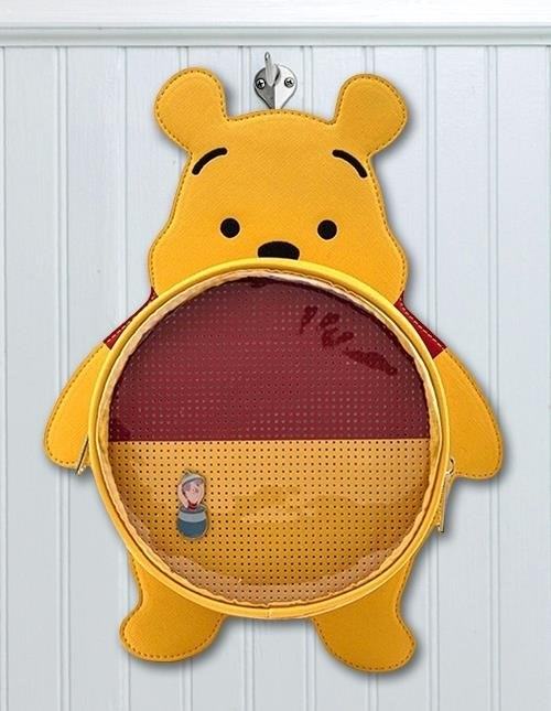 Winnie the Pooh Bag is a popular merchandise item featuring the beloved character from A.A. Milne's children's books, known for its cute and whimsical design.