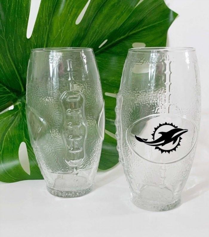 The Miami Dolphins Football Glasses are a stylish accessory for fans to show their support for the team while enjoying the game with a clear and comfortable vision.