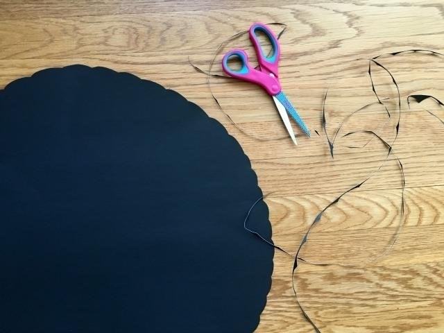 Step 2 - Scalloping the edge adds a decorative and elegant touch to the fabric or paper, creating a beautiful finished look.