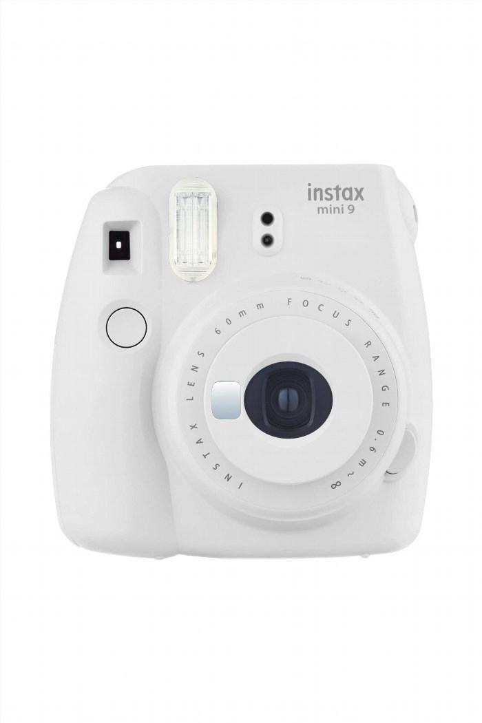 The Fujifilm Instax Mini 9 Instant Camera in Smokey White is a stylish and compact camera that allows you to capture and print your photos instantly, adding a touch of vintage charm to your memories.