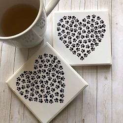 Klaygirl Dog Print Coasters are stylish and functional accessories that add a touch of charm and protect your surfaces from drink stains.