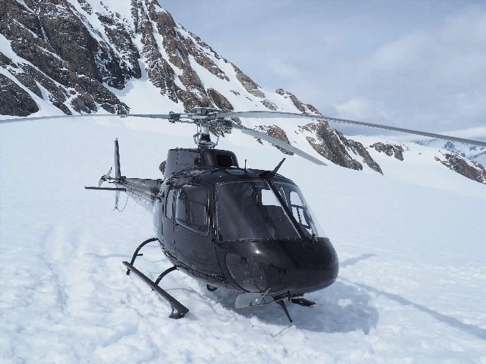 Helicopter landing on Tasman Glacier offers an extraordinary experience, allowing visitors to witness the stunning beauty of New Zealand's highest peak and the surrounding icy landscape.