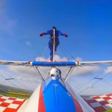 Wing Walking in England is an exhilarating activity that allows daredevils to walk on the wings of a flying plane, offering a thrilling experience and panoramic views of the beautiful English countryside.
