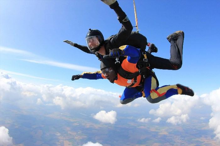 Skydiving over England offers an exhilarating experience, allowing you to enjoy stunning aerial views of the picturesque English countryside while feeling the rush of adrenaline as you soar through the sky.