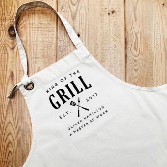 Tailored title apron: individualized present for father of boyfriend.