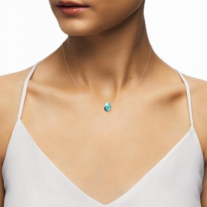 The Mermaid's Tear Necklace is a beautiful piece of jewelry that is said to contain a magical tear droplet from a mermaid, symbolizing love and enchantment.