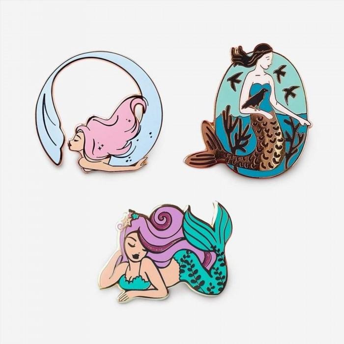 Enamel Mermaid Pins are exquisite accessories that showcase the mythical beauty of mermaids, with their vibrant colors and intricate designs.