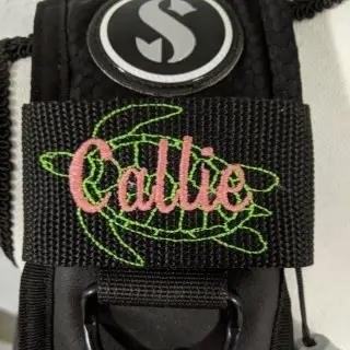 The Sea turtle dive tag BCD with custom name from Broider is a personalized accessory that allows you to showcase your love for marine life while diving.