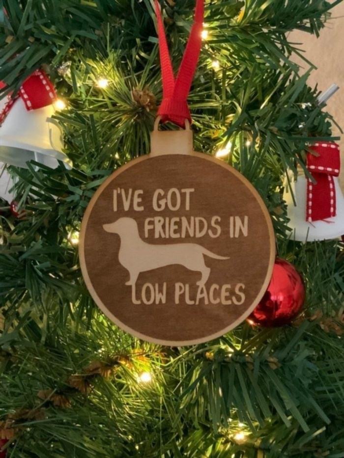 I have Friends In Low Places Dachshund Birch Ornament from Etsy seller StudioA2H.