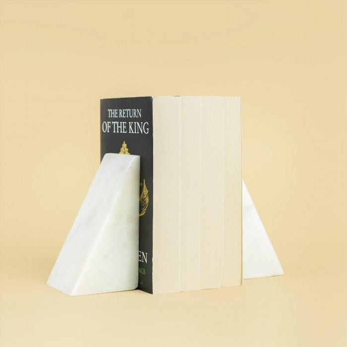Bookends or Book Stand Gifts are practical and stylish accessories that can add charm and organization to any bookshelf or desk. They make perfect gifts for book lovers and can be personalized to suit individual tastes and preferences. Whether it's a classic design or a modern and quirky one, bookends or book stand gifts are not only functional but also decorative pieces that can enhance the aesthetic appeal of any space.
