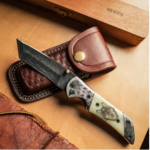 Engraved Wolf On Bone Damascus Tanto Folder 1