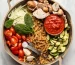 ingredients for one pot pasta arranged in cooking pan before cooking on marble background