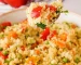 spoonful of couscous with vegetables.