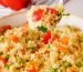 spoonful of couscous with vegetables.