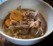 white bowl containing mushroom stew with Opies pickled walnuts