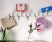 Wood and clothespins on a table ready to assemble wall organizer